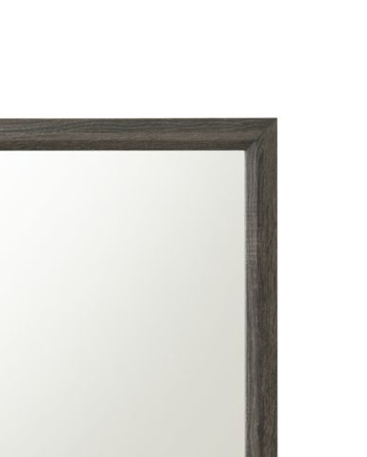 Closeup of a dark wood grain mirror frame with a clean white reflective surface