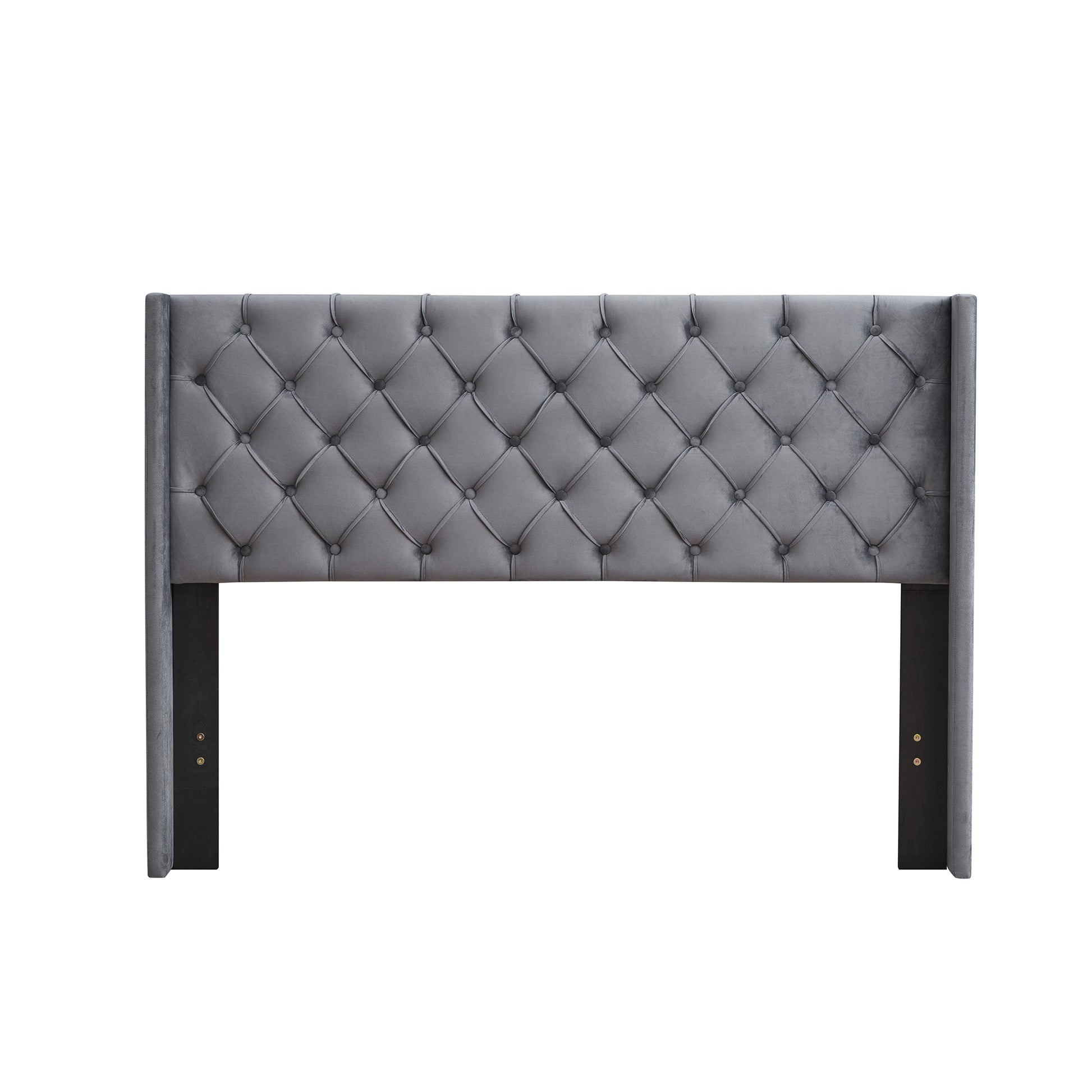 Grey velvet upholstered headboard with diamond tufting