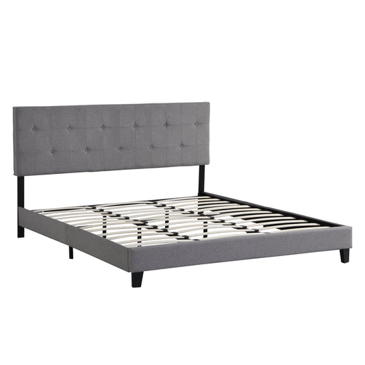 Tufted grey fabric bed frame with a buttontufted headboard and slatted wooden platform support for a mattress