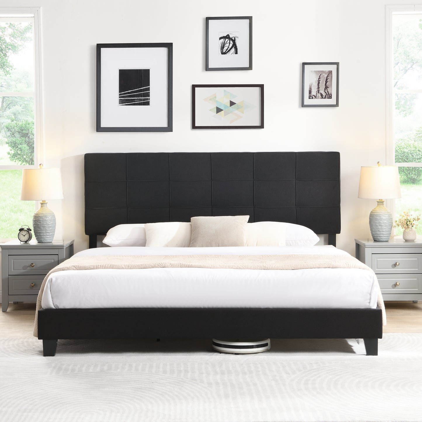 Black upholstered queen bed frame with tufted headboard