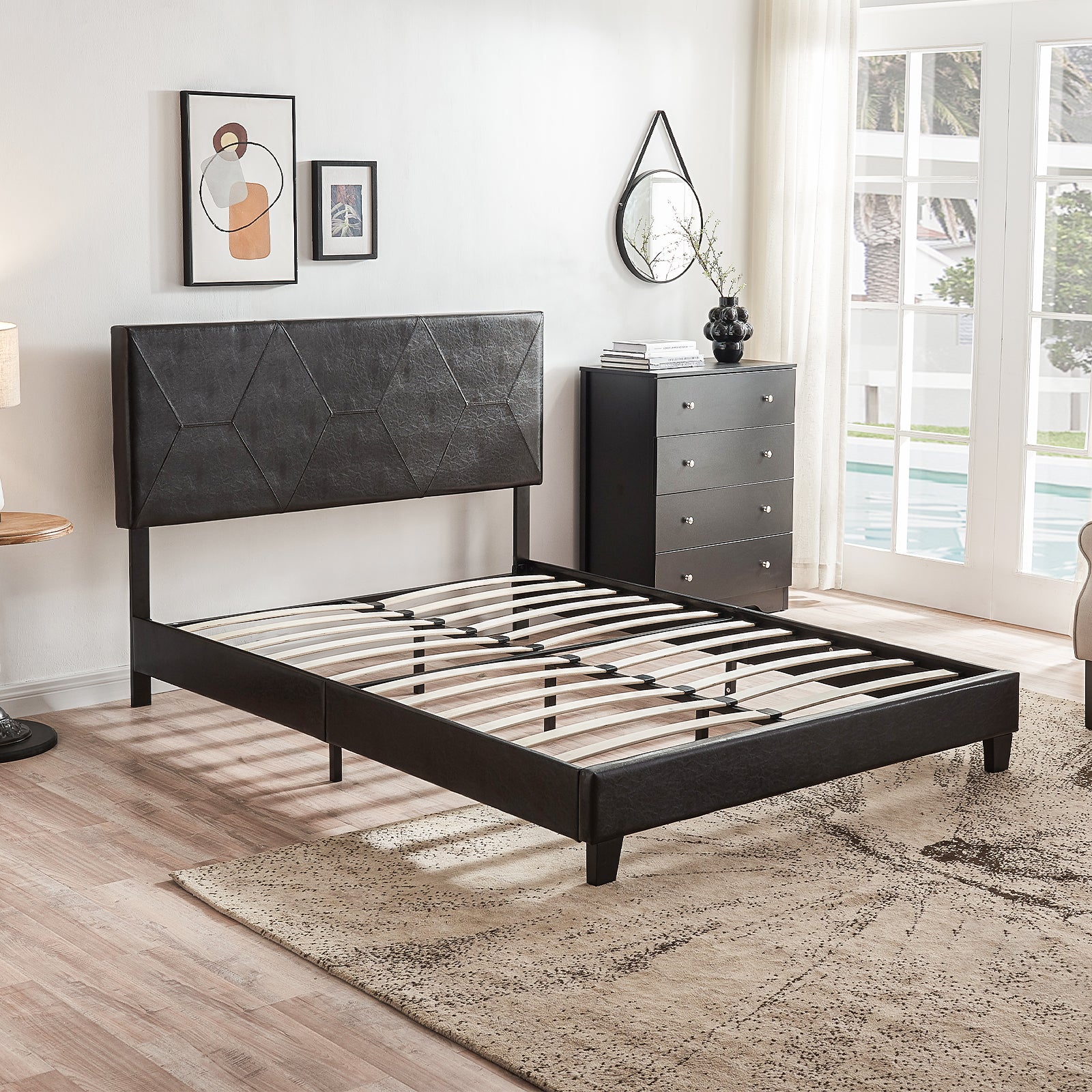 Modern black faux leather platform bed frame with geometric headboard and wooden slats