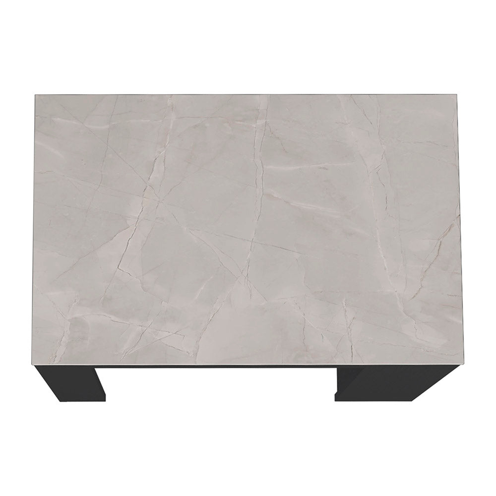 Light gray marble top coffee table with minimalist legs