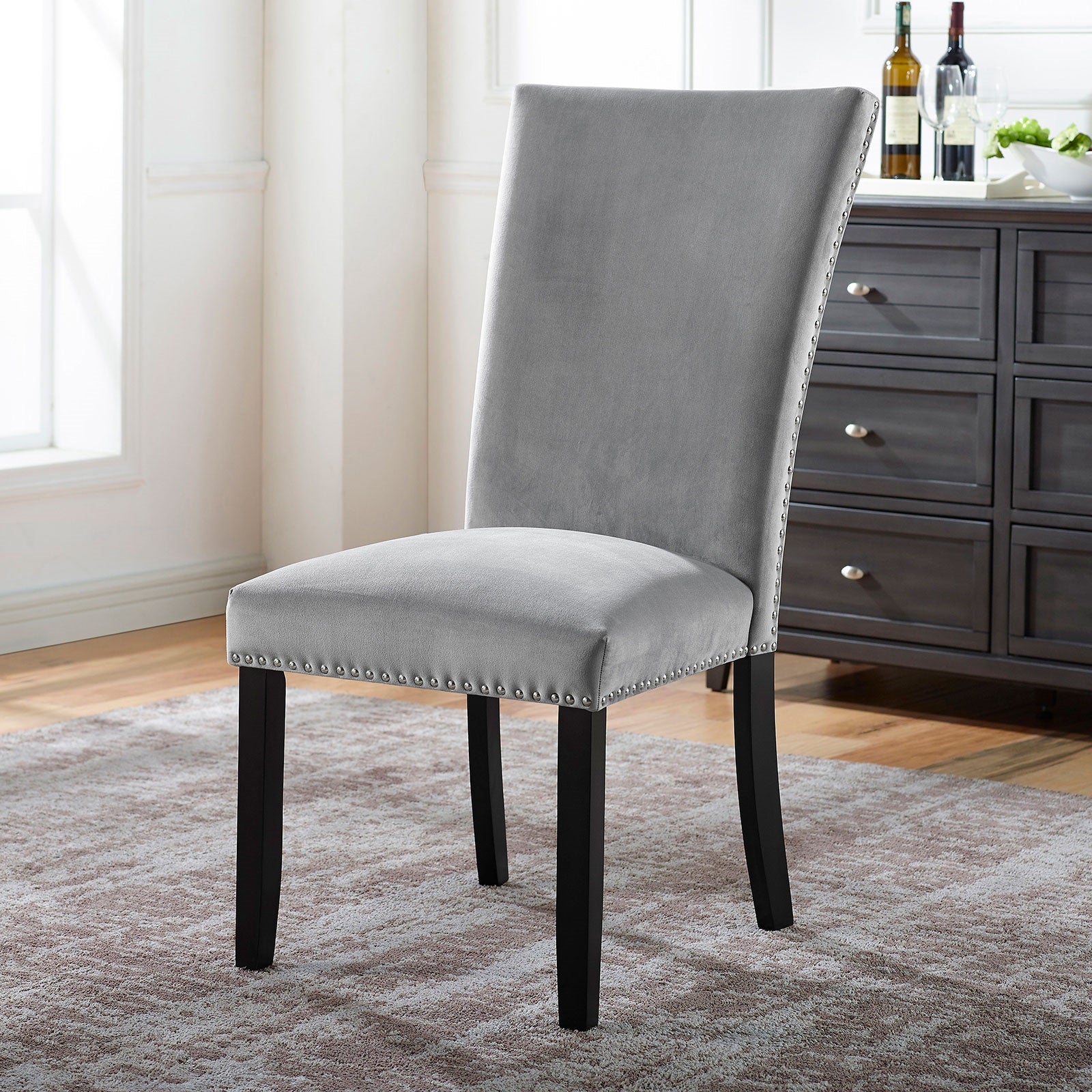 Grey velvet dining chair with nailhead trim