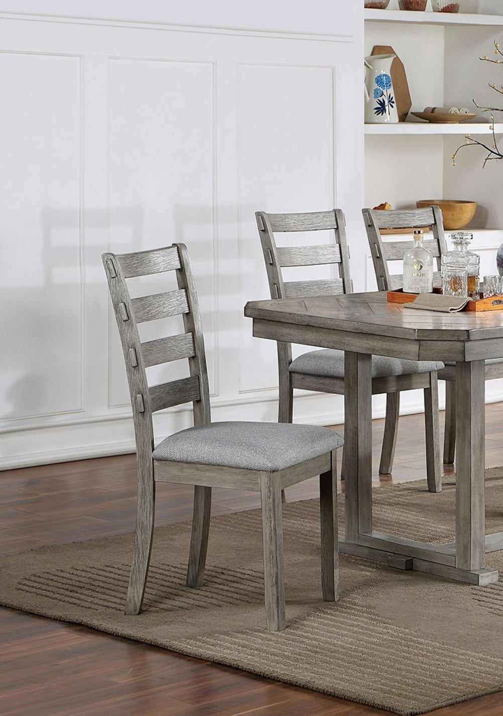 Rustic gray dining chairs with horizontal slat back and upholstered seat