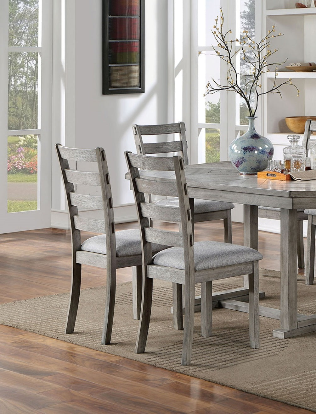 Rustic gray wooden dining chair with upholstered seat