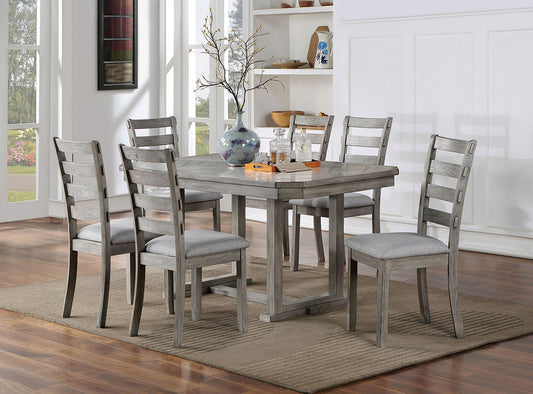 Gray wood dining table set with upholstered chairs