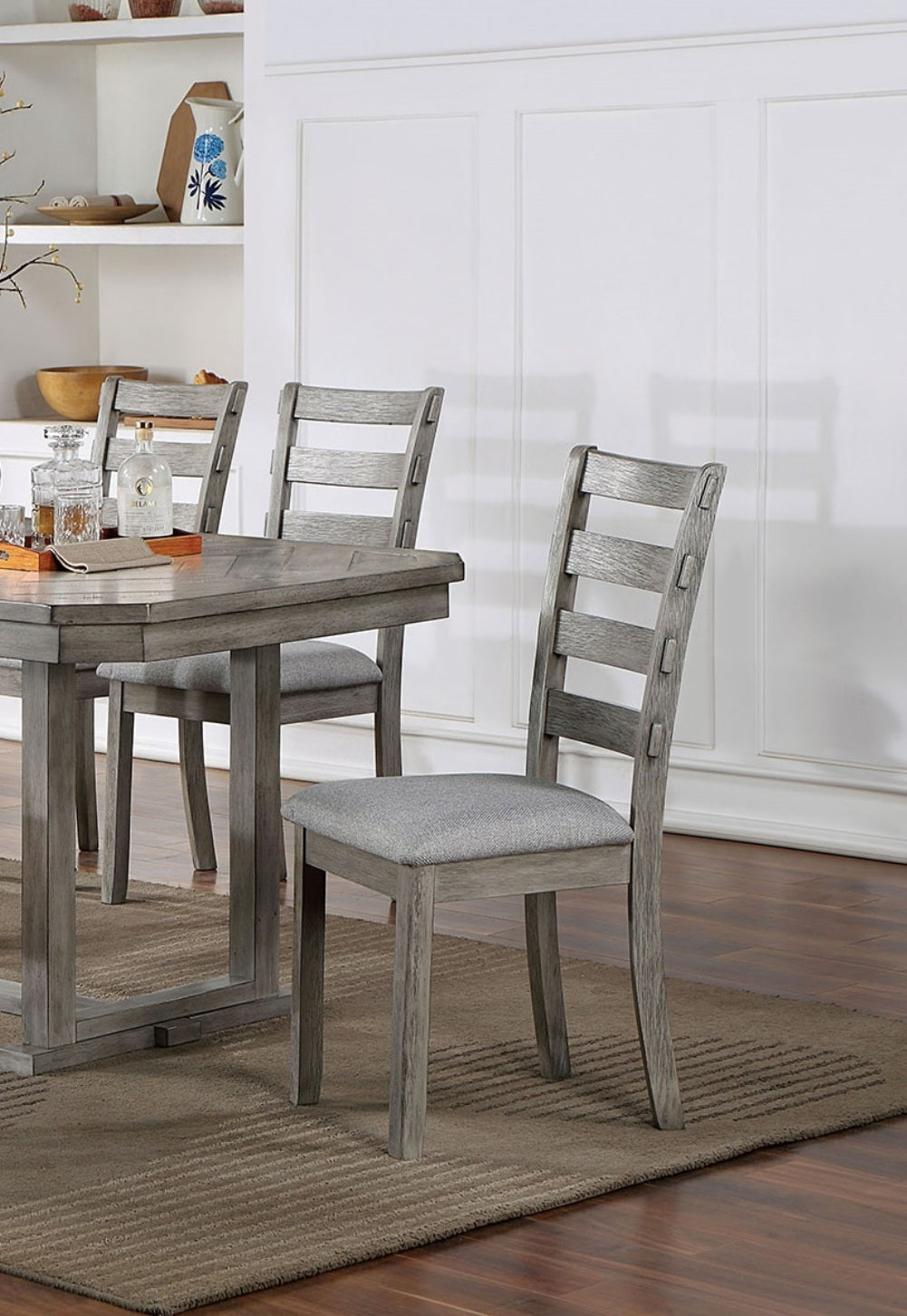 Grey upholstered dining chair with horizontal slat back