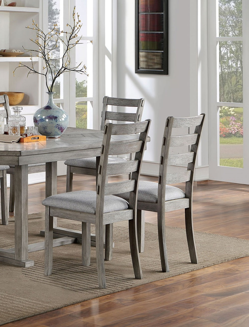 Rustic grey wooden dining chair with upholstered seat