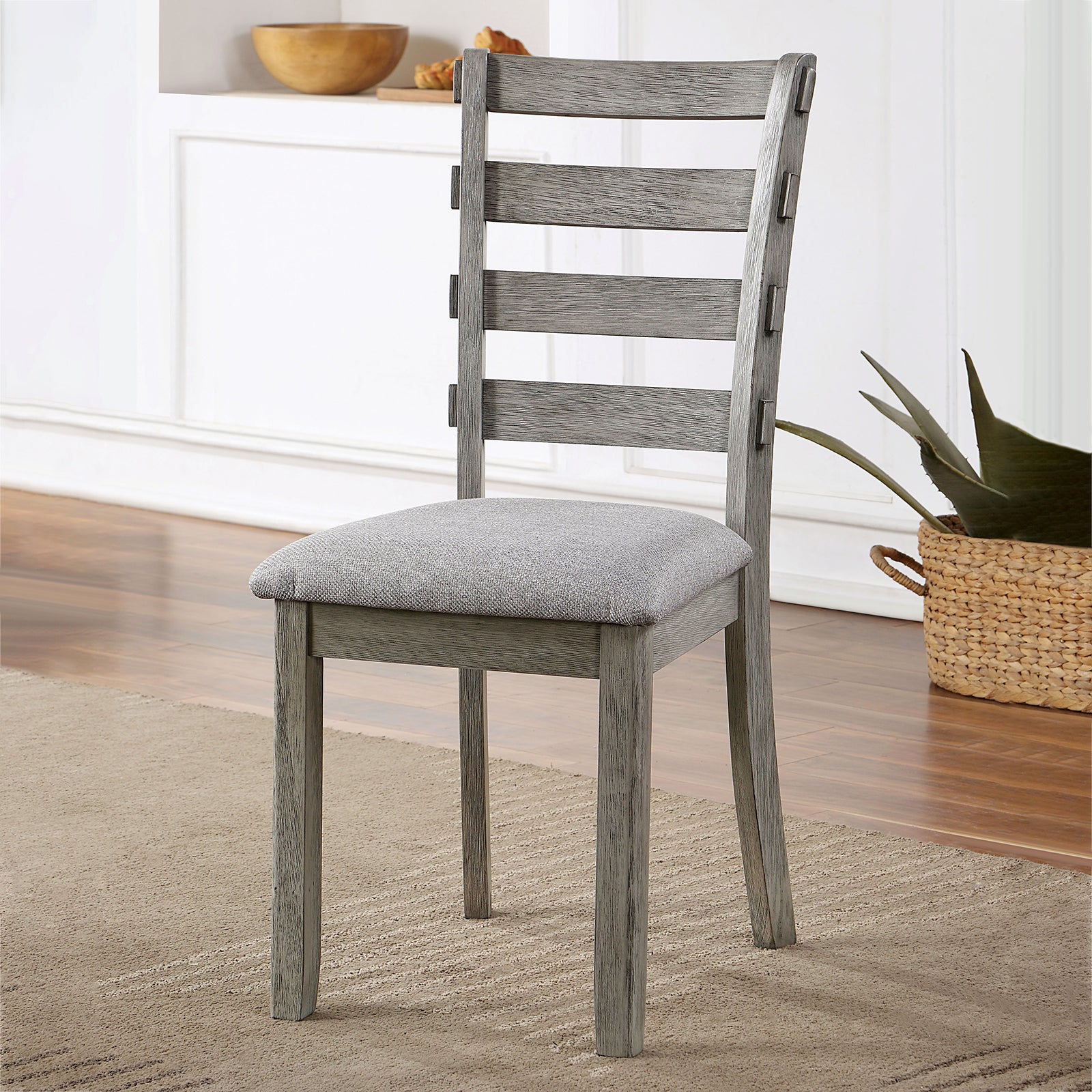 Gray wooden dining chair with upholstered seat