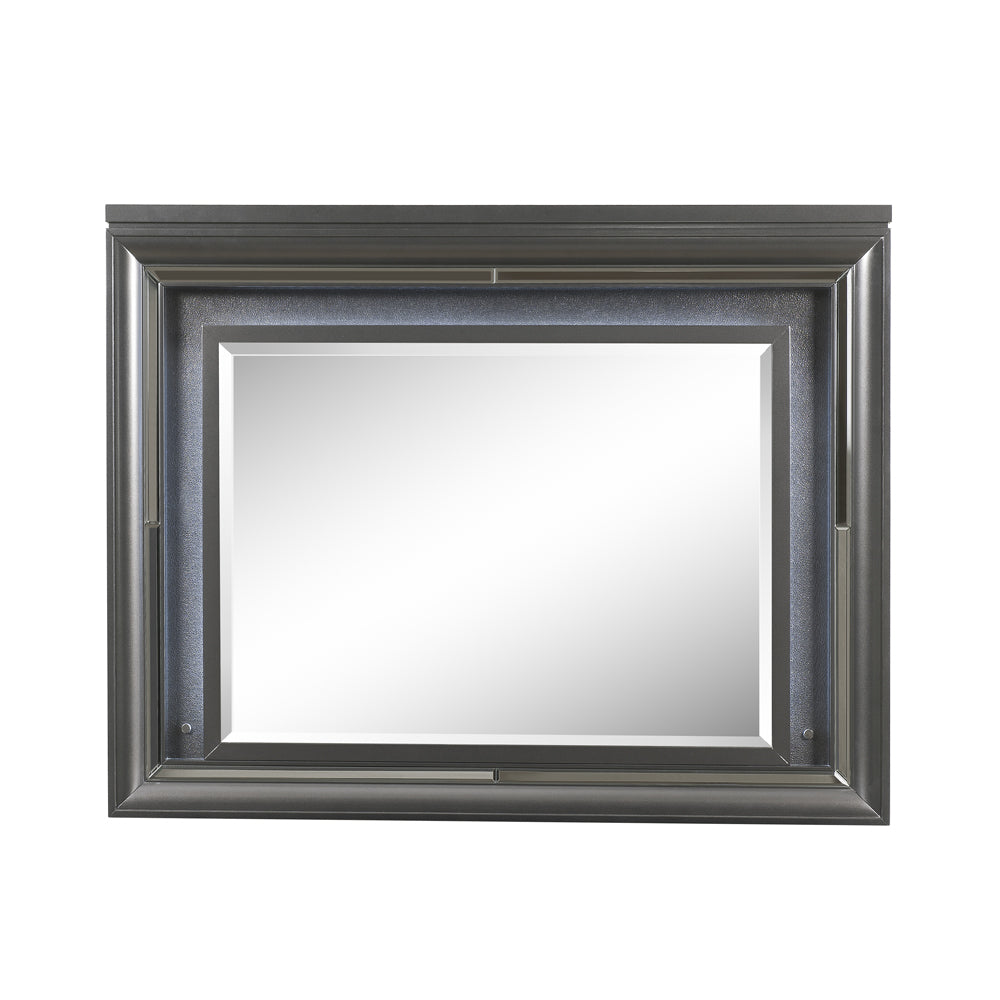 Ornate silver framed wall mirror with beveled glass