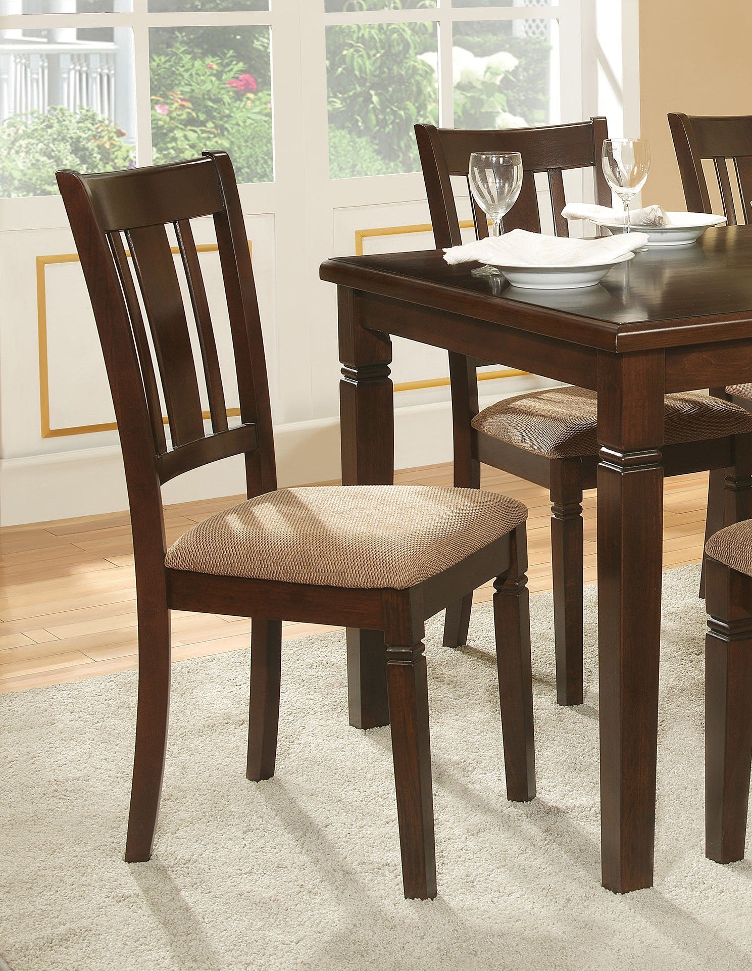 Dark brown wooden dining chair with upholstered seat