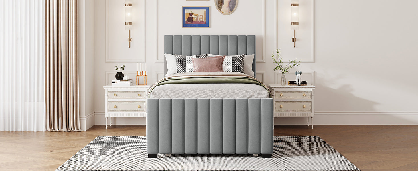 Gray upholstered platform bed with vertical channel tufting