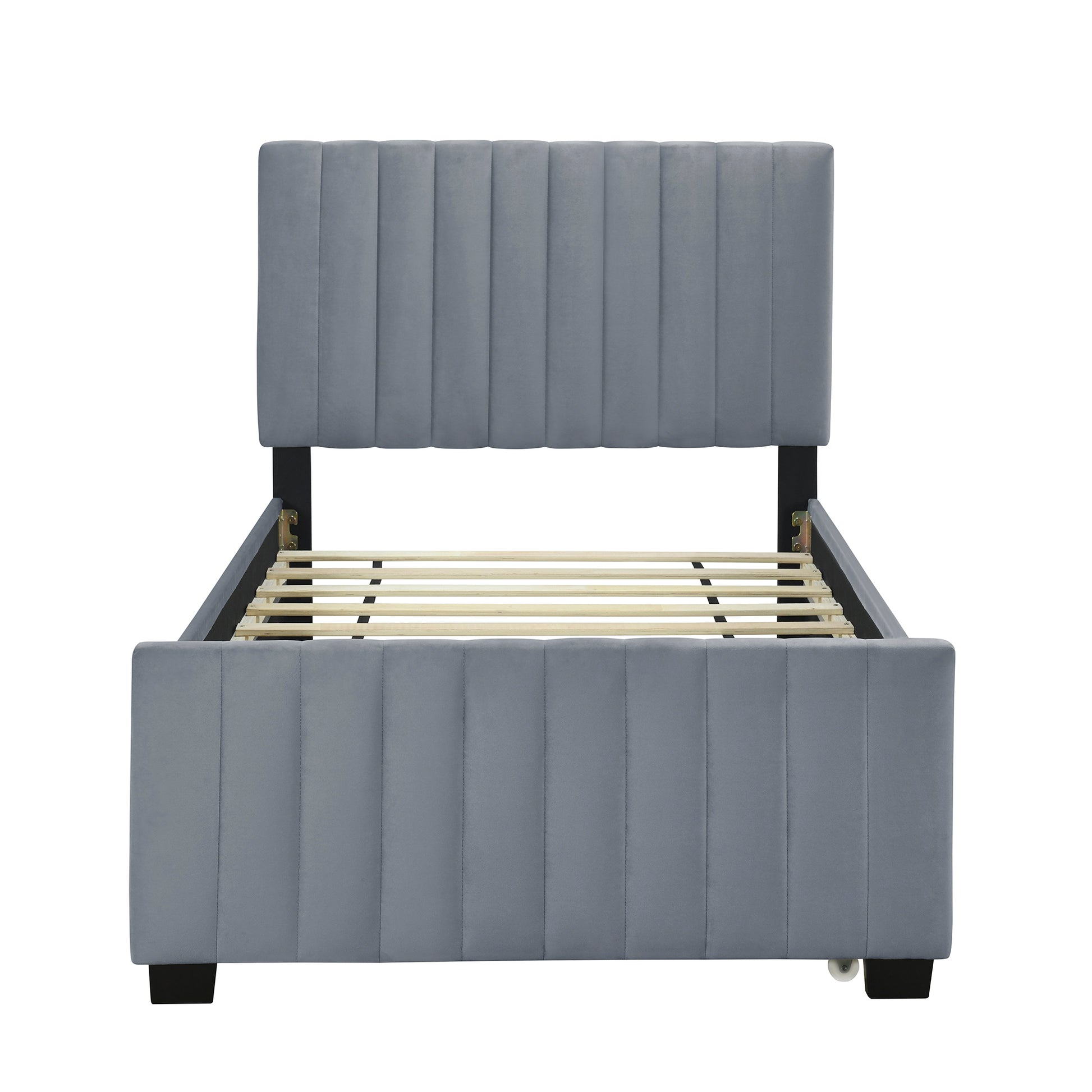 Gray velvet upholstered platform bed frame with vertical channel tufting and wooden slats