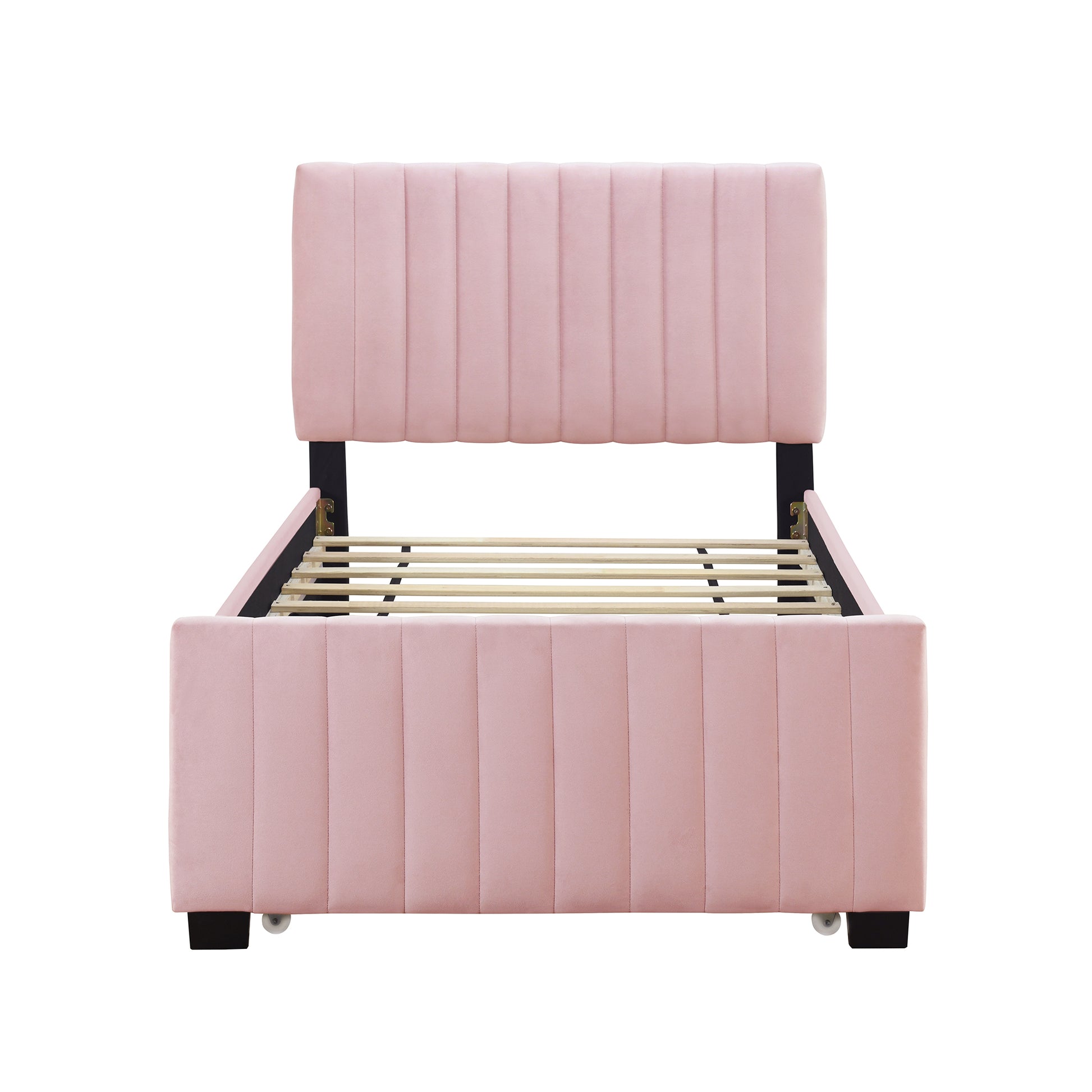 Pink velvet platform bed frame with vertical channel tufting and wooden slats for mattress support