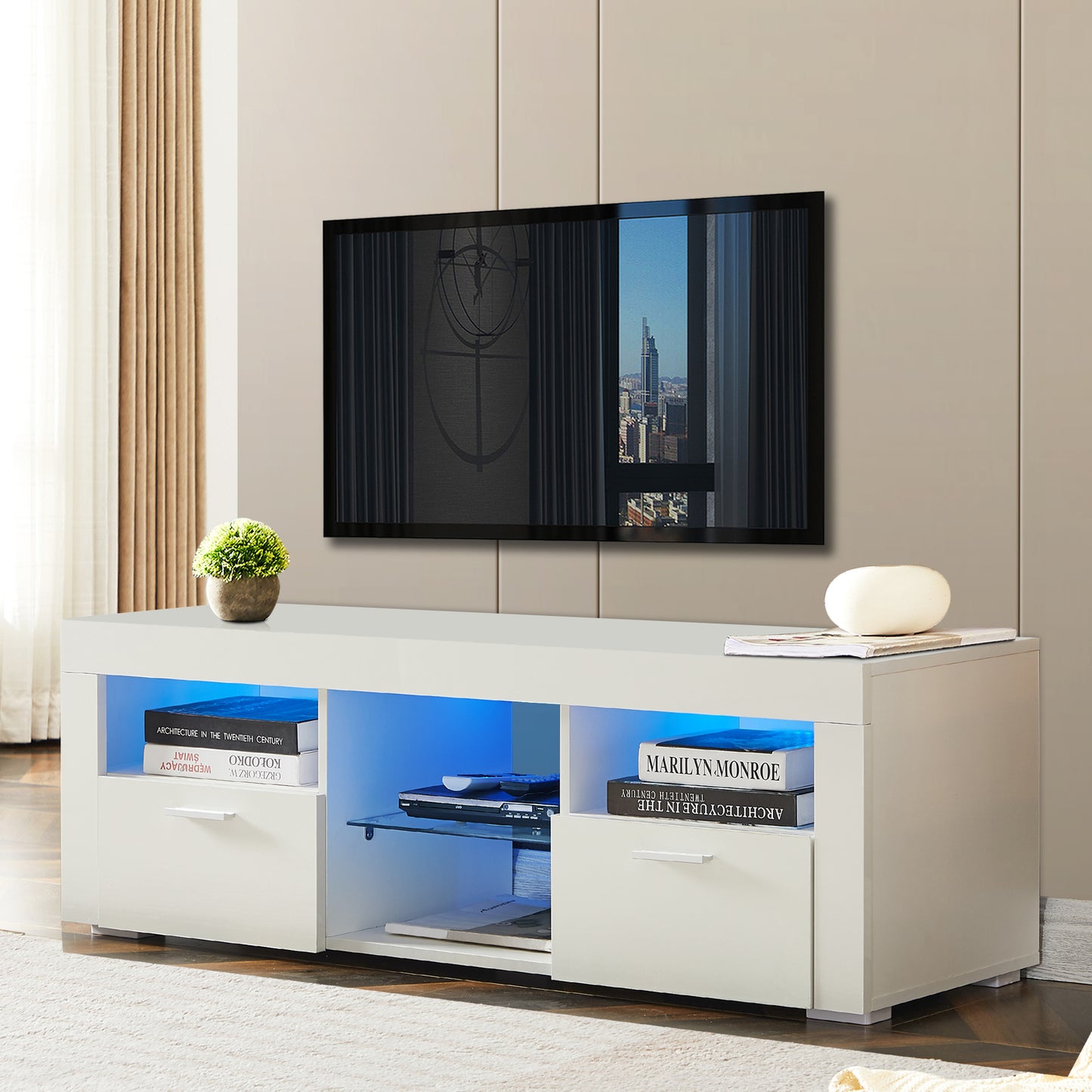 Modern white TV stand with blue LED lighting featuring two drawers and open shelving for media consoles and decor