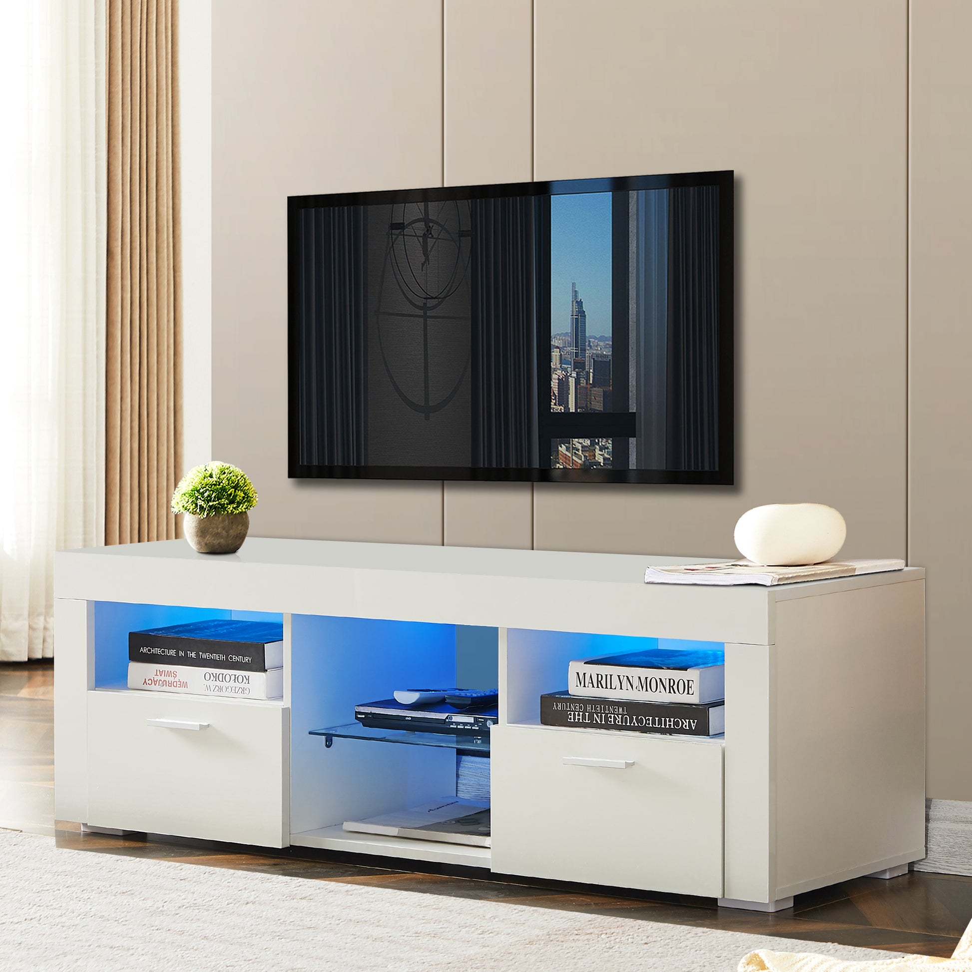 Modern white TV stand with blue LED lighting featuring two drawers and open shelving for media consoles and decor