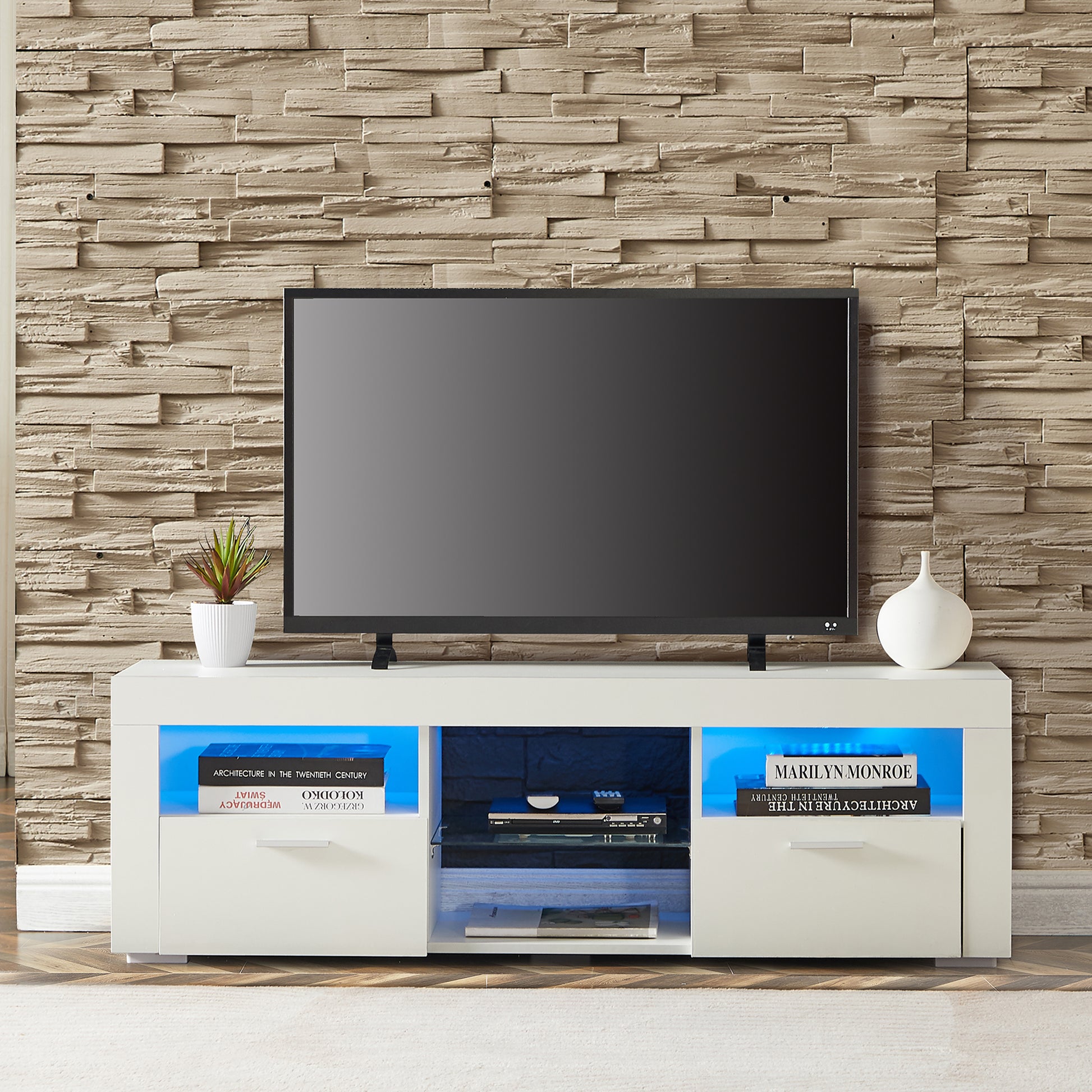Modern white TV stand with blue LED lighting and ample storage