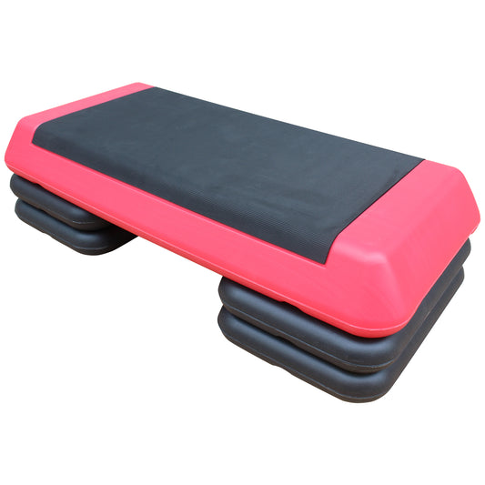 Pink and black adjustable aerobic step with stacked risers for home workouts