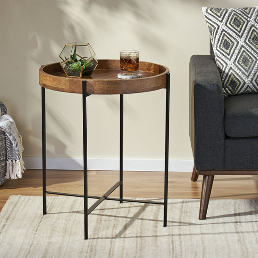 Round wood side table with geometric metal base and tray top for drinks