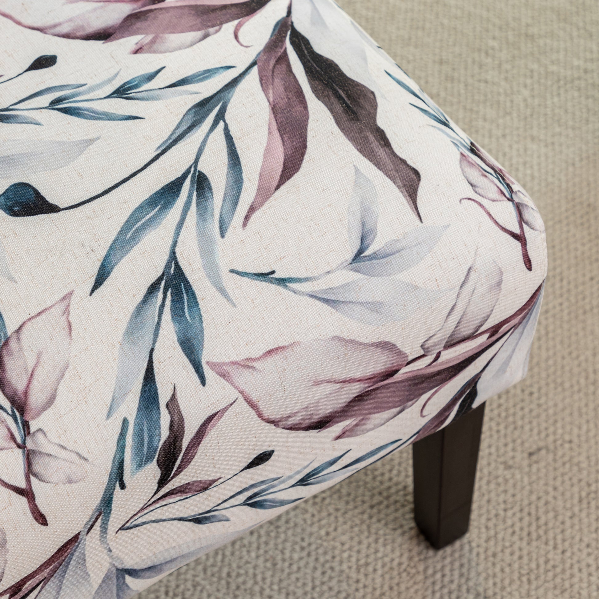Cream accent chair with watercolor floral leaf print