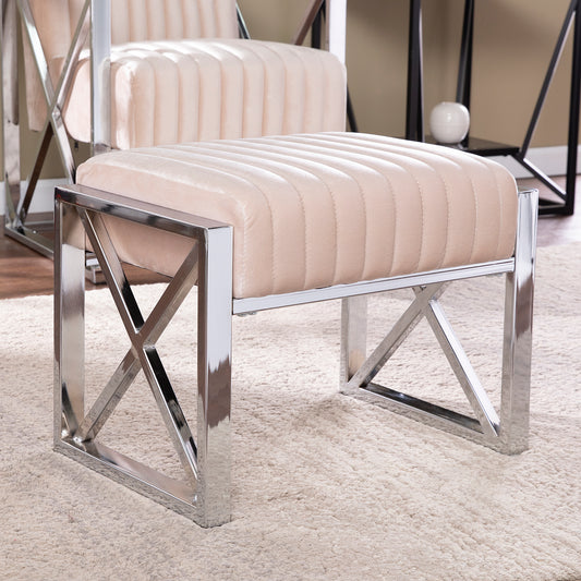Beige velvet upholstered ottoman with chrome geometric base