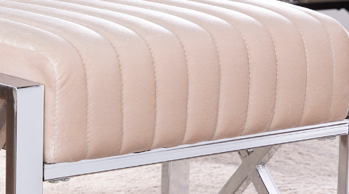 Champagne velvet tufted bench with polished chrome legs