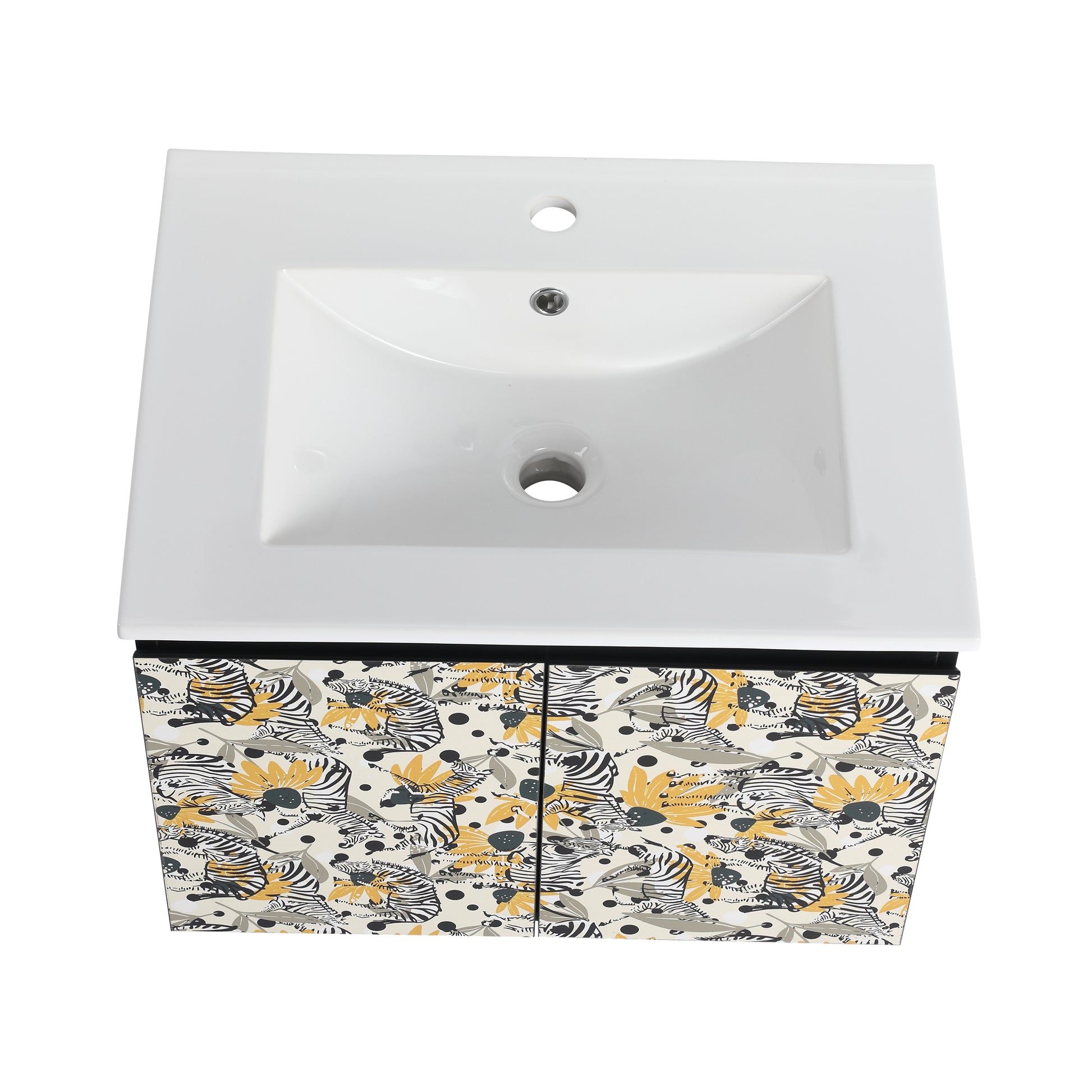 White ceramic sink with a white vanity cabinet featuring a fun zebra and floral print
