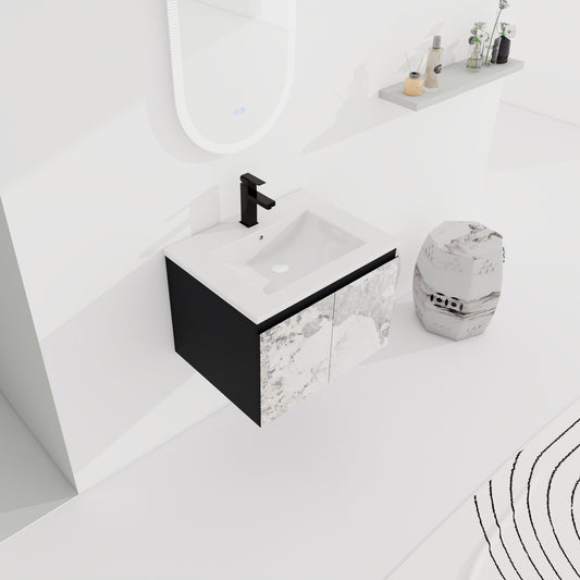 Modern black and white marble bathroom vanity with integrated sink and chrome faucet