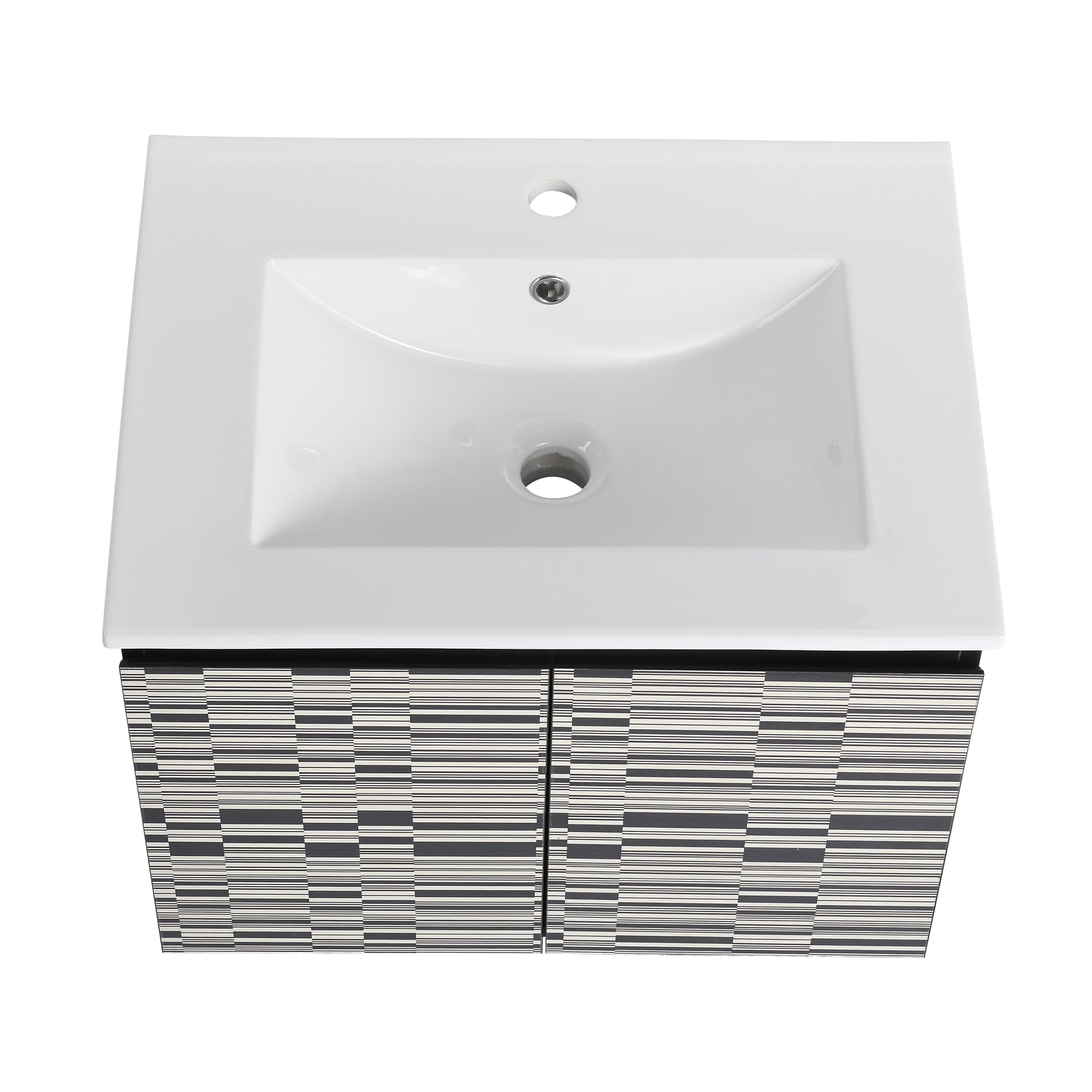 White ceramic bathroom vanity with patterned black and white cabinet doors