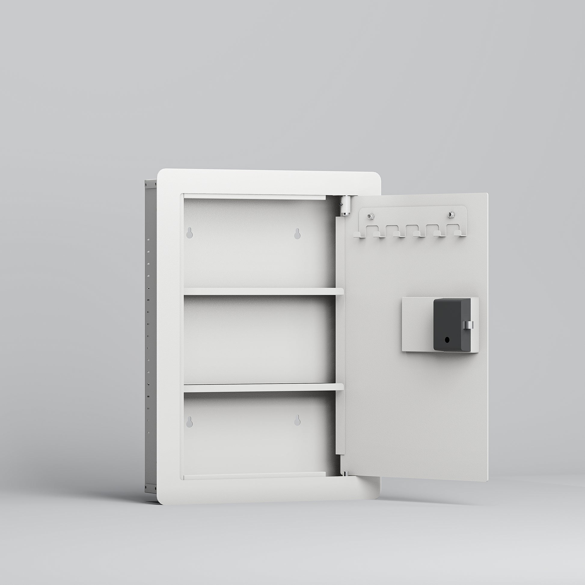 White metal medicine cabinet with three shelves and internal key hooks