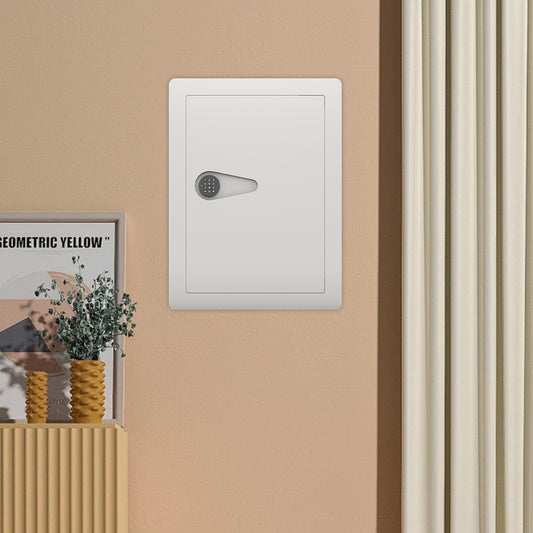 White wall safe with digital keypad and silver handle mounted securely
