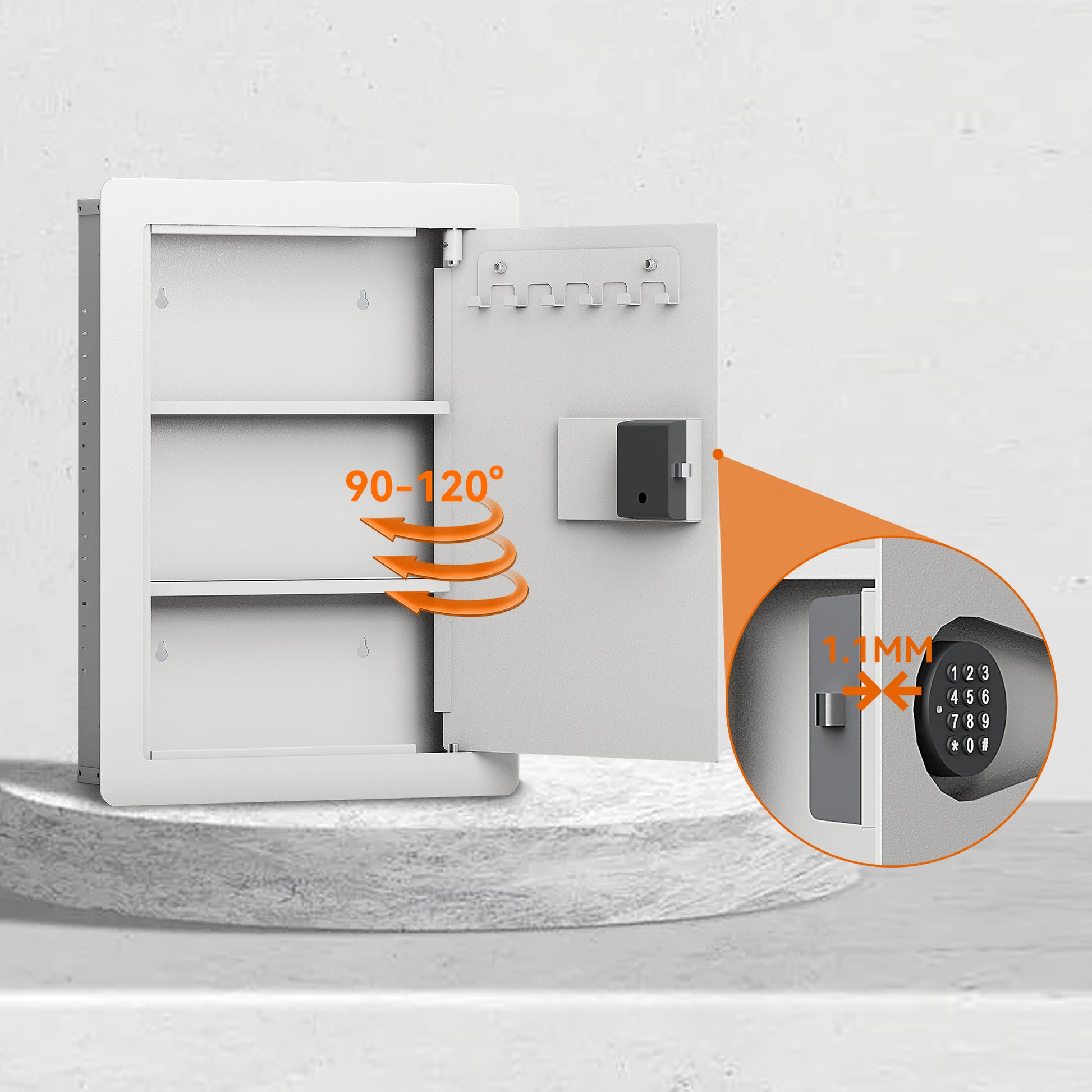 White metal wall safe with interior shelves and key hooks open