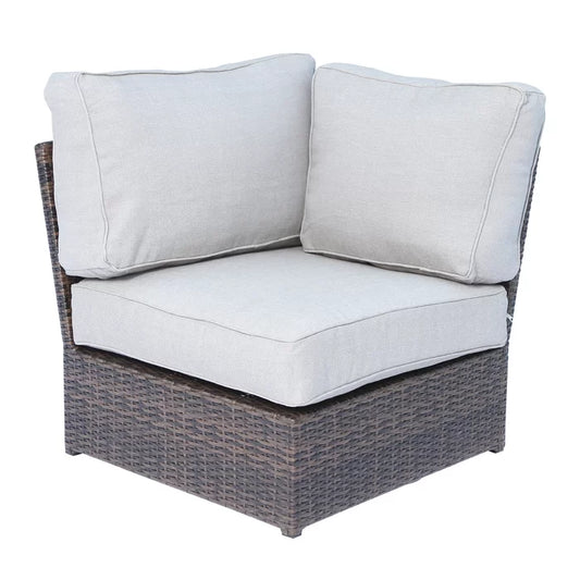 Brown wicker outdoor sofa corner with light grey cushions
