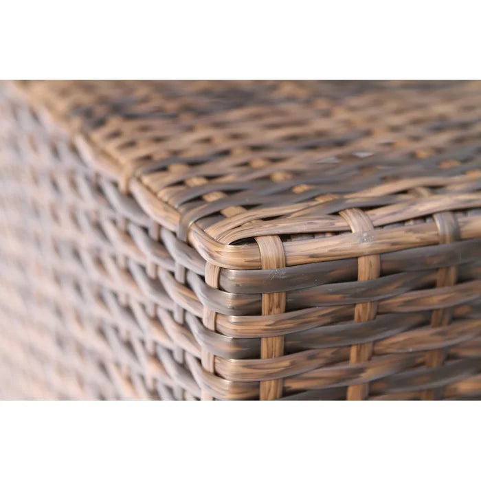 Closeup of brown wicker weave texture on a sectional furniture piece