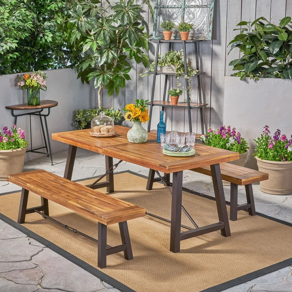 Wooden outdoor dining table with benches and metal legs