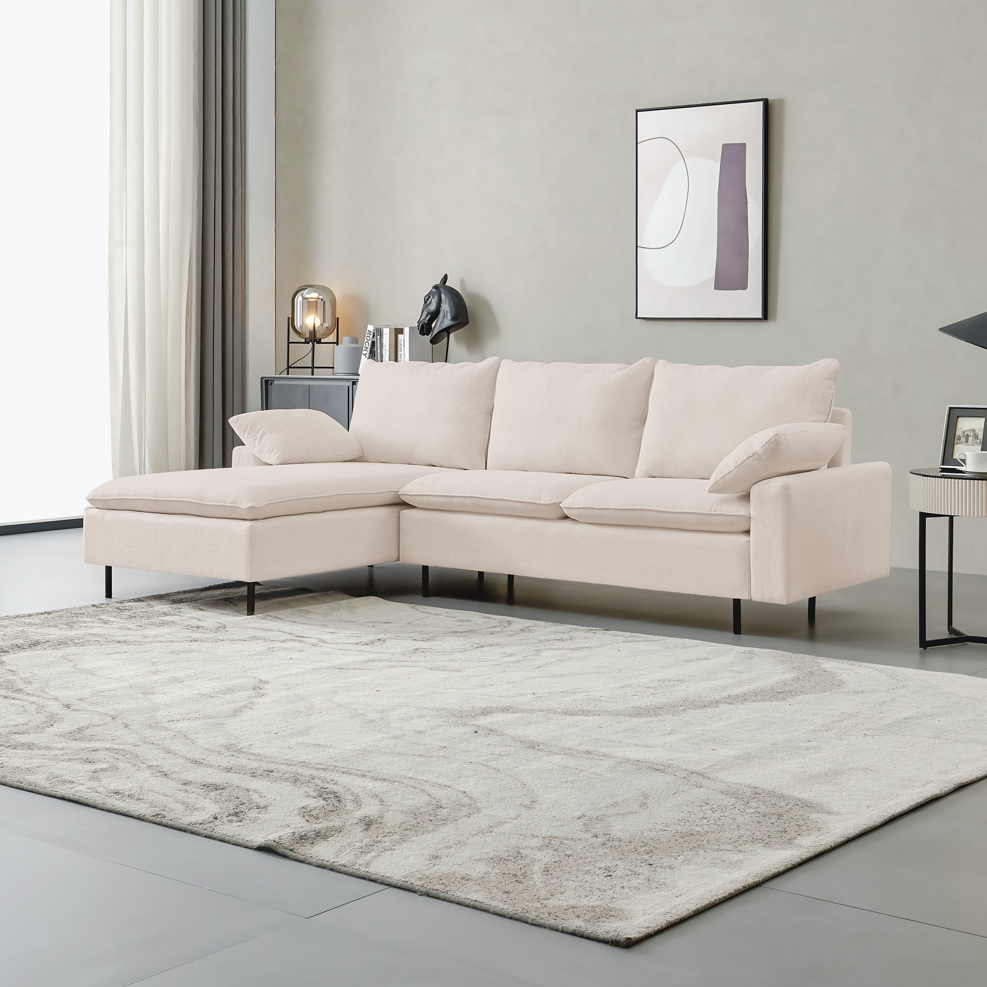 Cream sectional sofa with chaise lounge and plush cushions for living room comfort