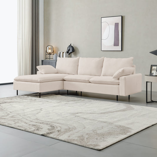 Cream sectional sofa with chaise lounge and plush cushions for living room comfort