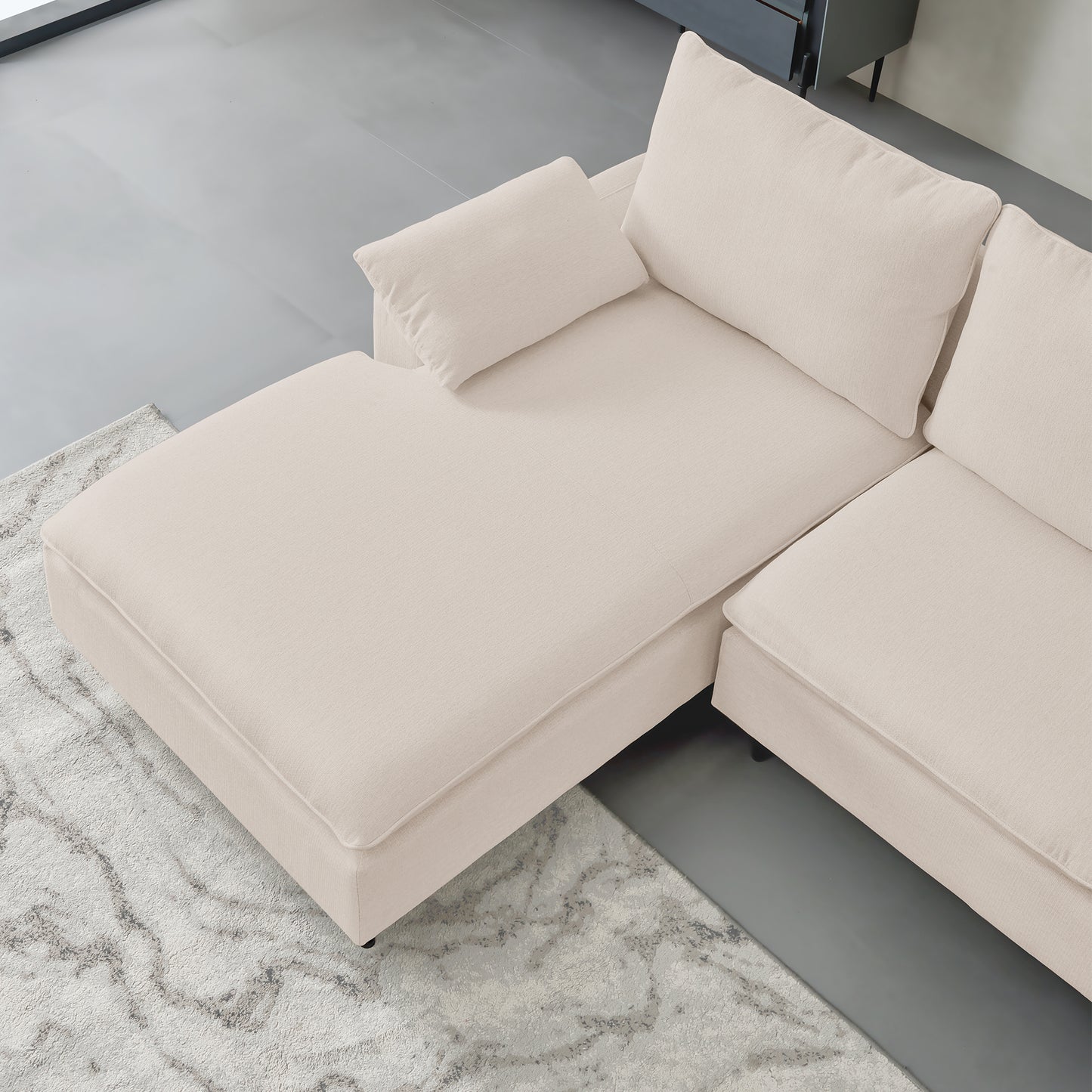 Plush beige sectional sofa with chaise lounge perfect for modern living rooms