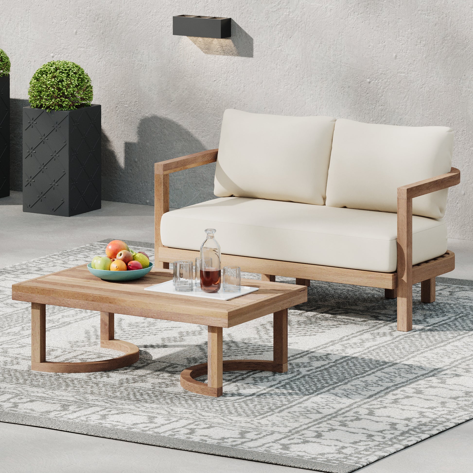 Modern outdoor sofa with cream cushions and natural wood frame perfect for patios