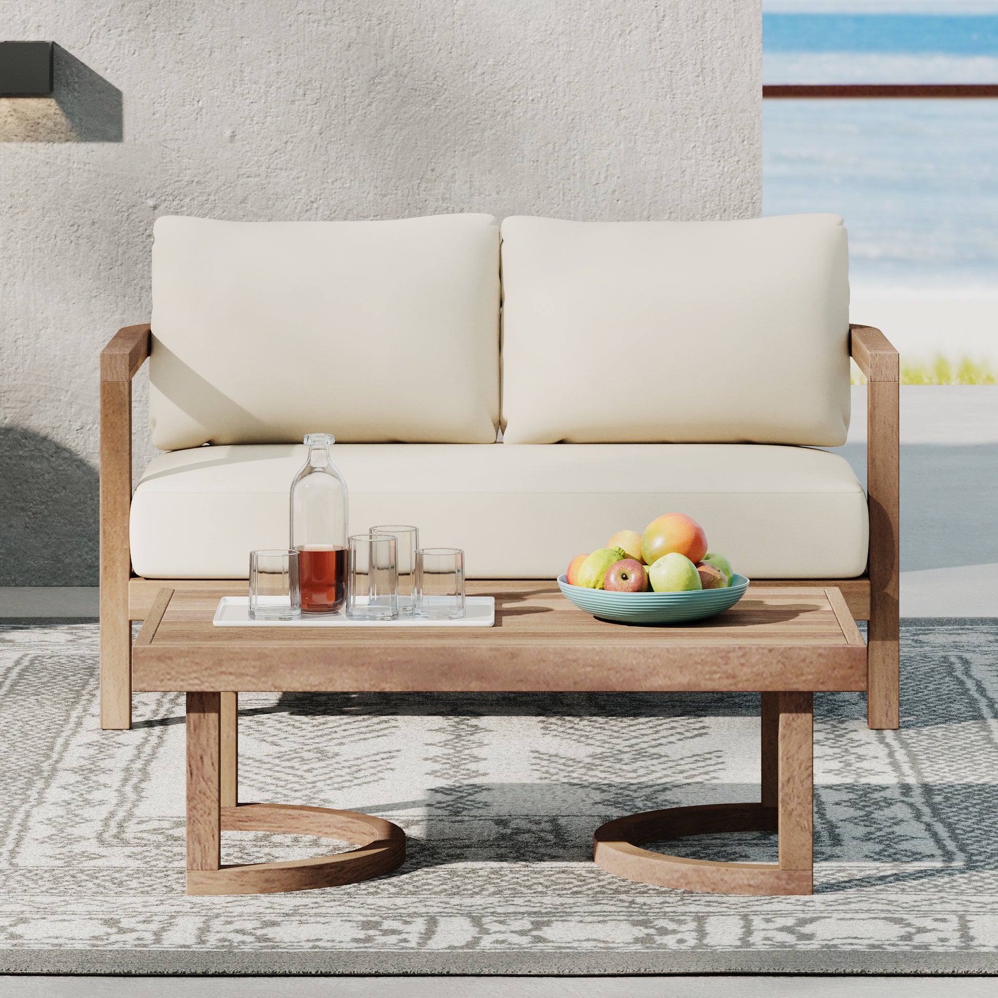 Modern outdoor loveseat with plush cream cushions and a solid wood frame