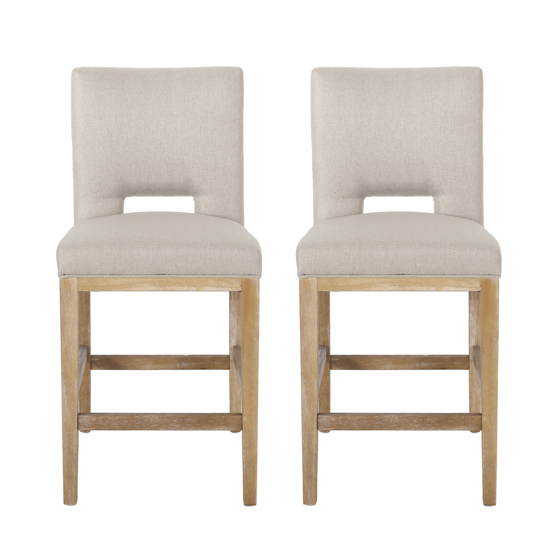 Two beige upholstered counter height bar stools with light wood legs