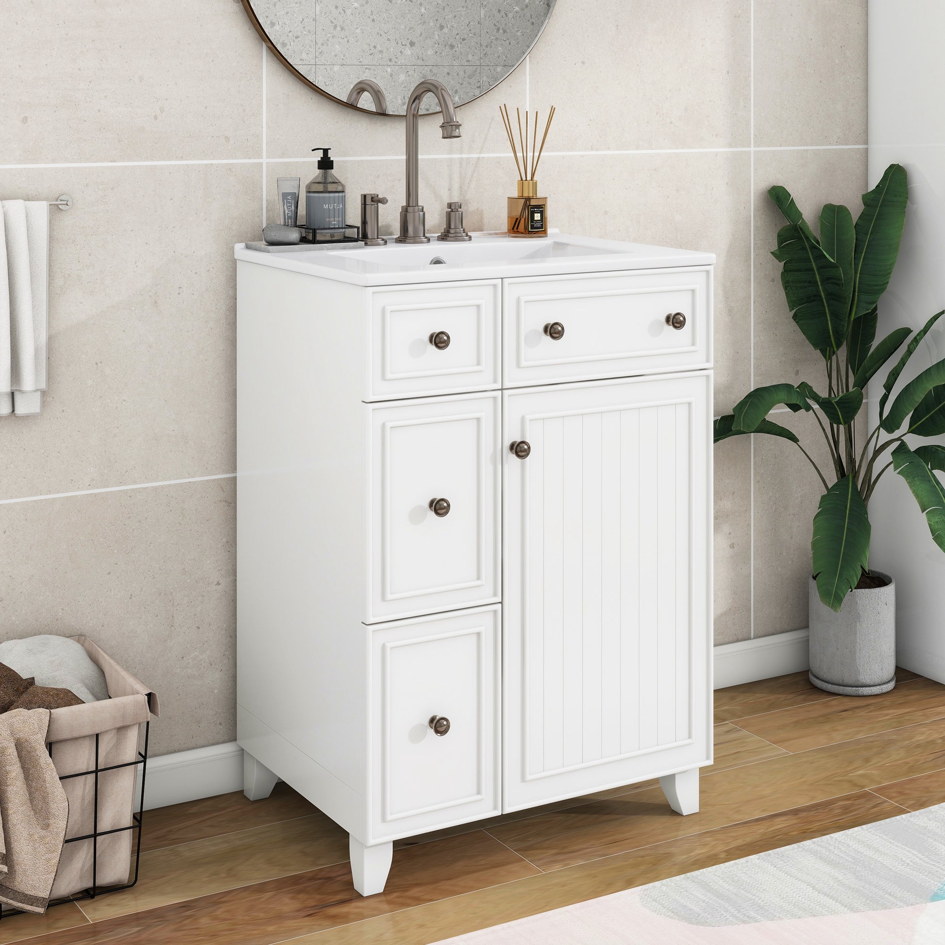 White bathroom vanity with shaker style doors and bronze hardware ideal for storage