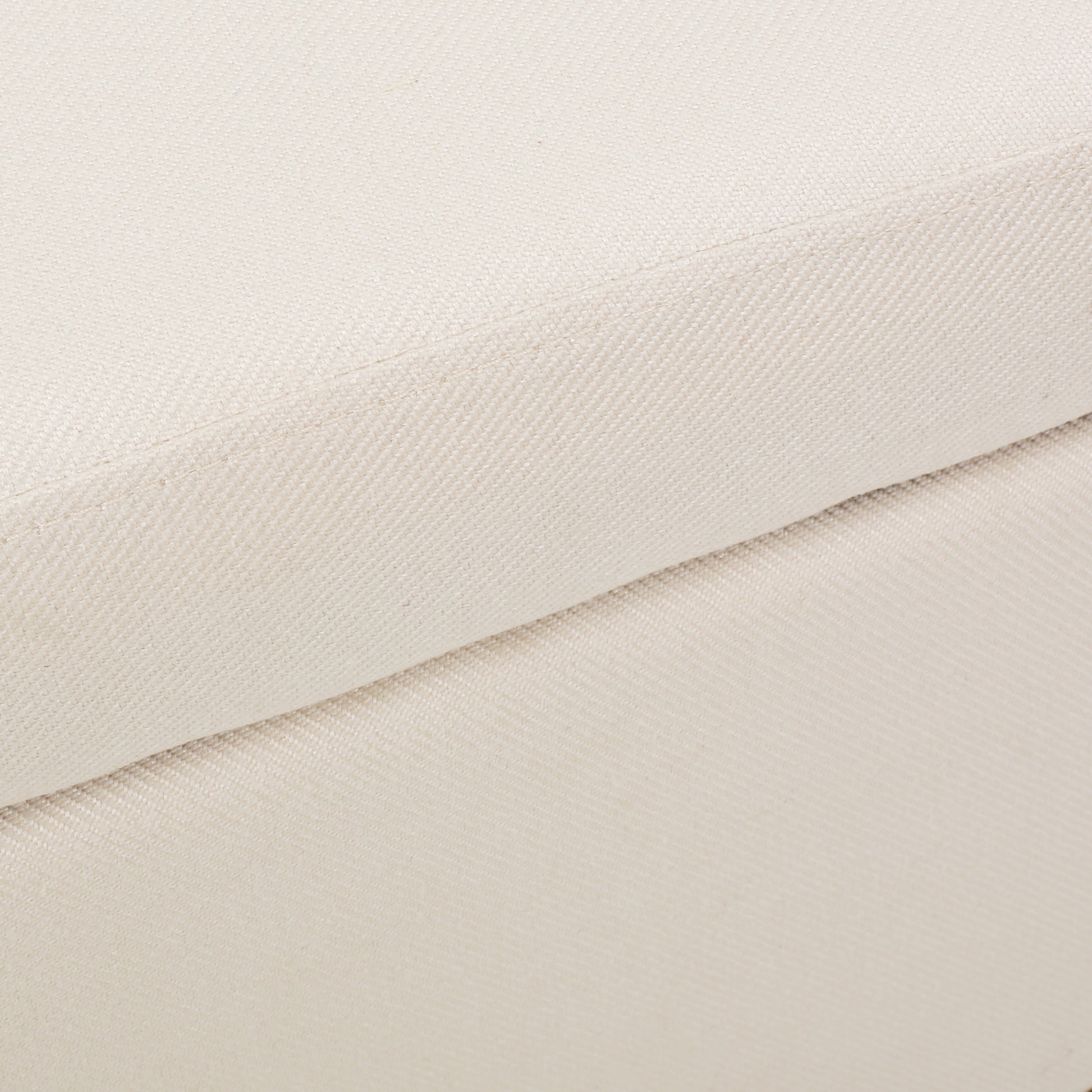 Closeup of woven cream textured fabric perfect for upholstery and home decor