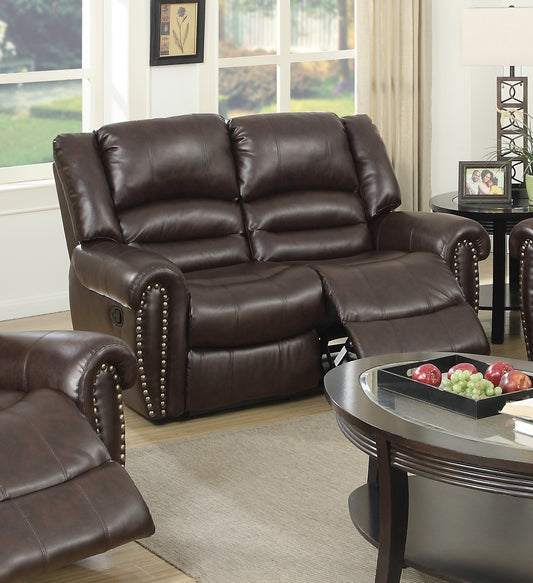 Brown leather reclining loveseat with nailhead trim providing comfortable seating