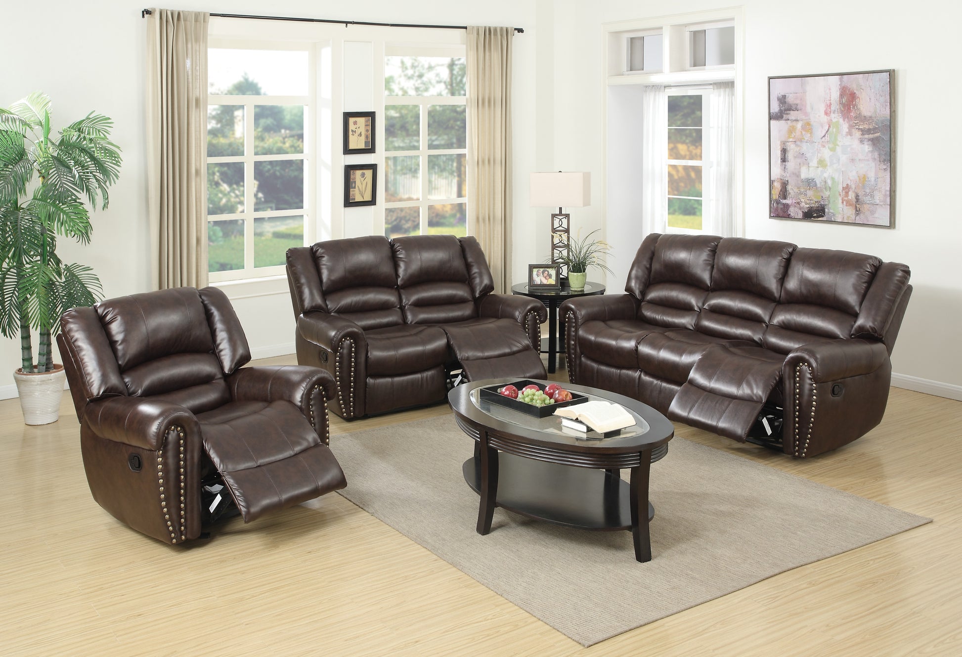 Dark brown leather recliner chair with decorative studs and reclined footrest