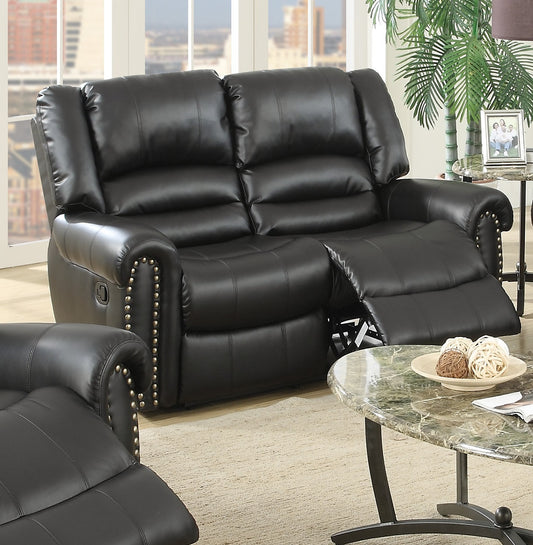 Black leather loveseat recliner with decorative nailhead trim and plush cushions