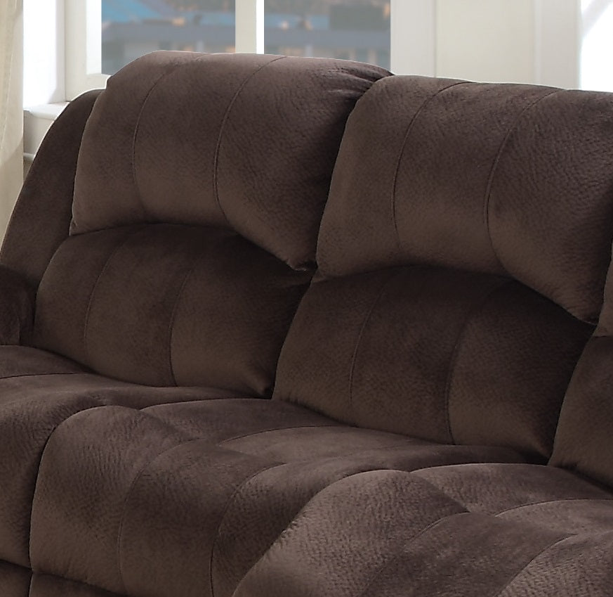 Plush chocolate brown recliner sofa with tufted seating and padded headrests