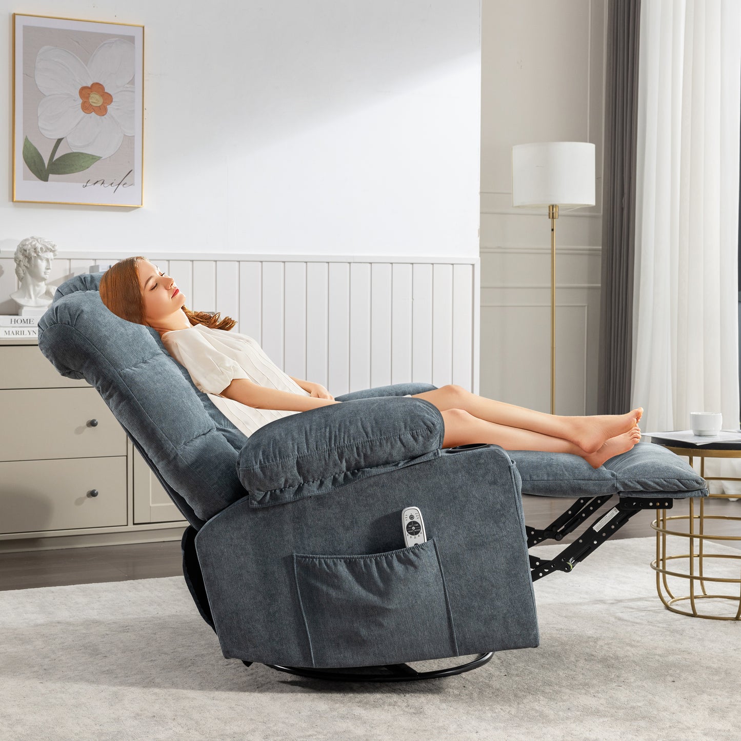 Gray fabric recliner chair with plush cushioning and remote control for ultimate relaxation
