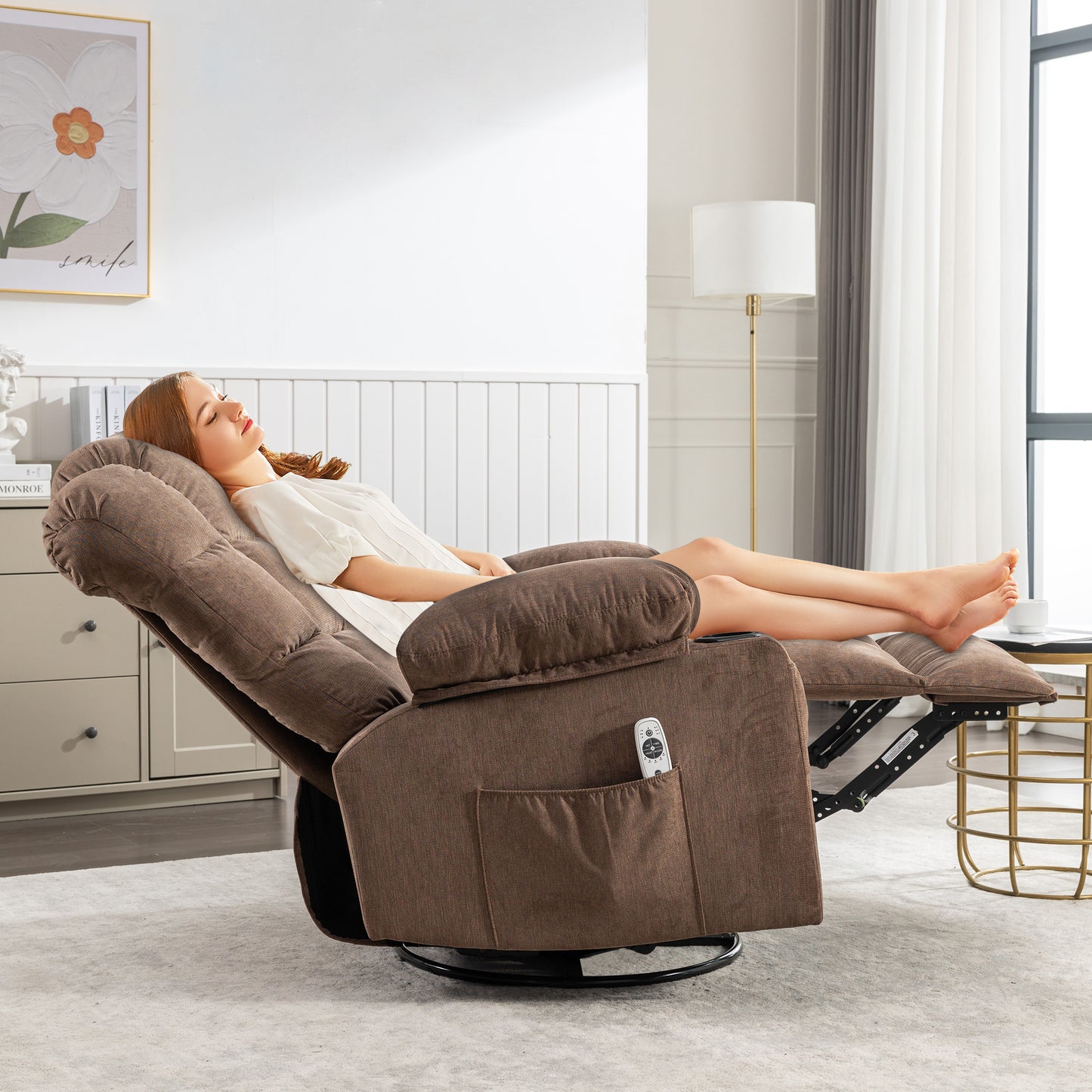 Brown fabric power recliner with footrest and remote perfect for relaxation