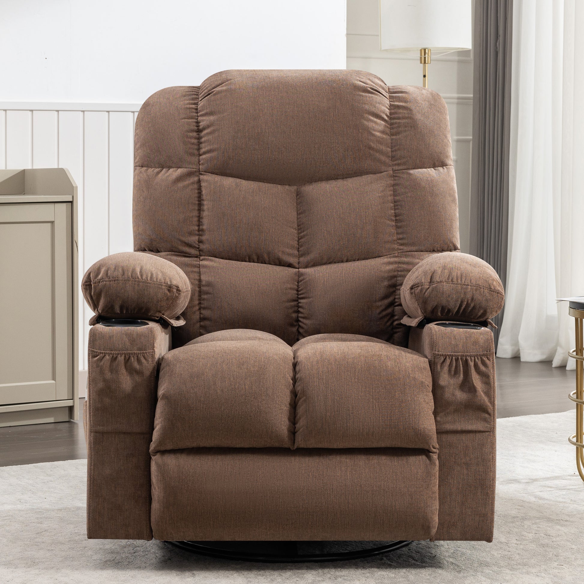 Plush brown fabric recliner chair with padded arms cup holders and side pockets for home relaxation